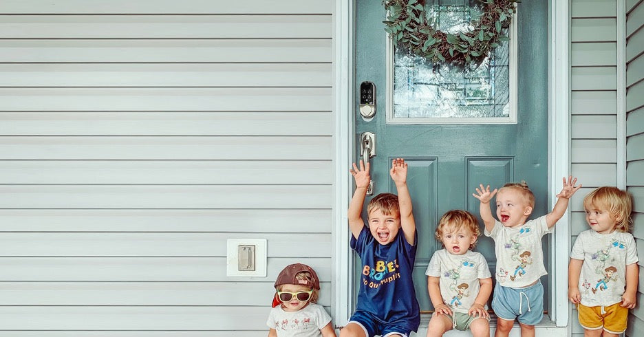 A family using childproof door locks from Lockly