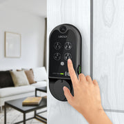 Person inputing code in Lockly Smart Lock