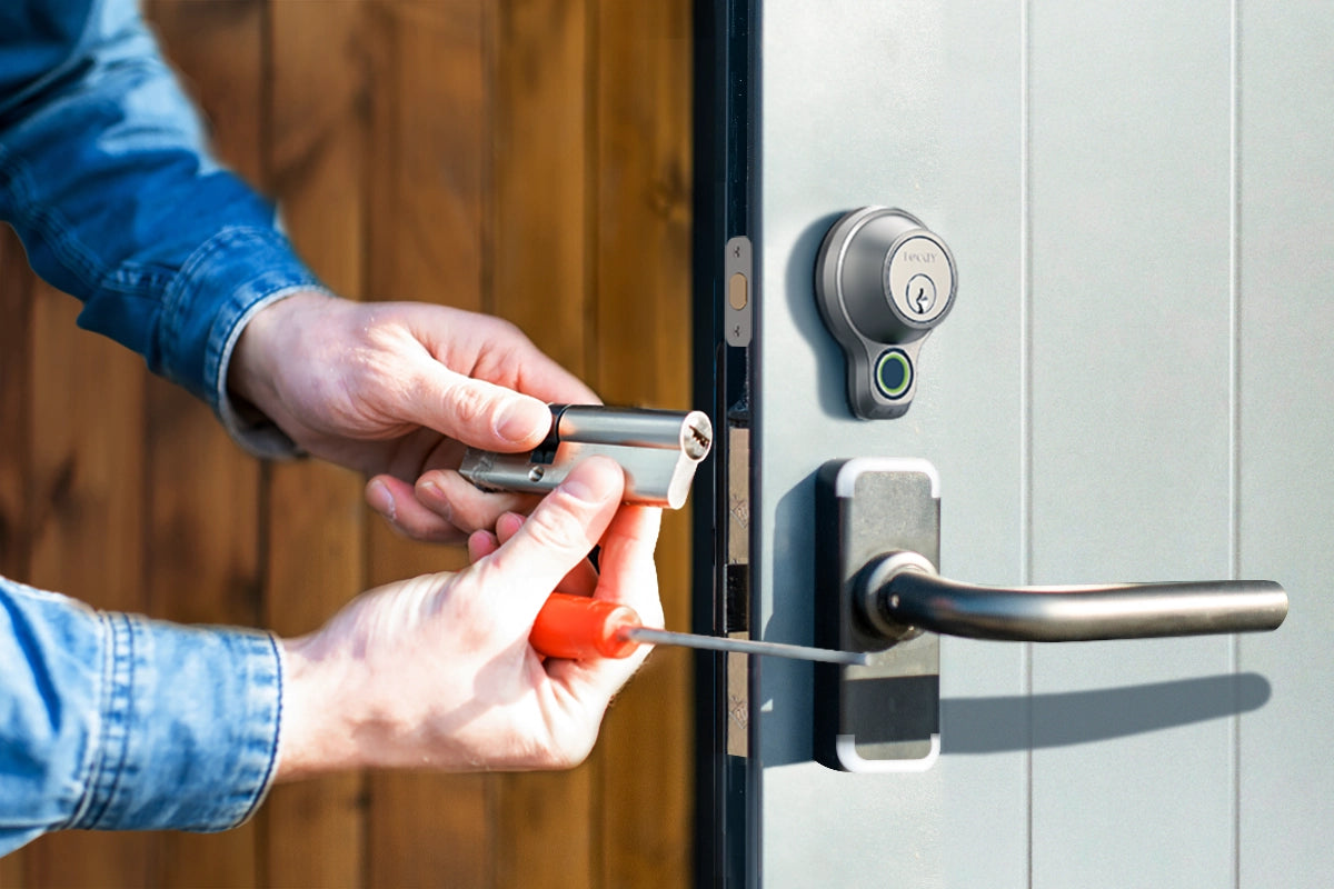 A person showing different deadbolt lock types.