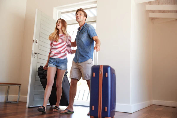 A family arriving at their secure Airbnb.